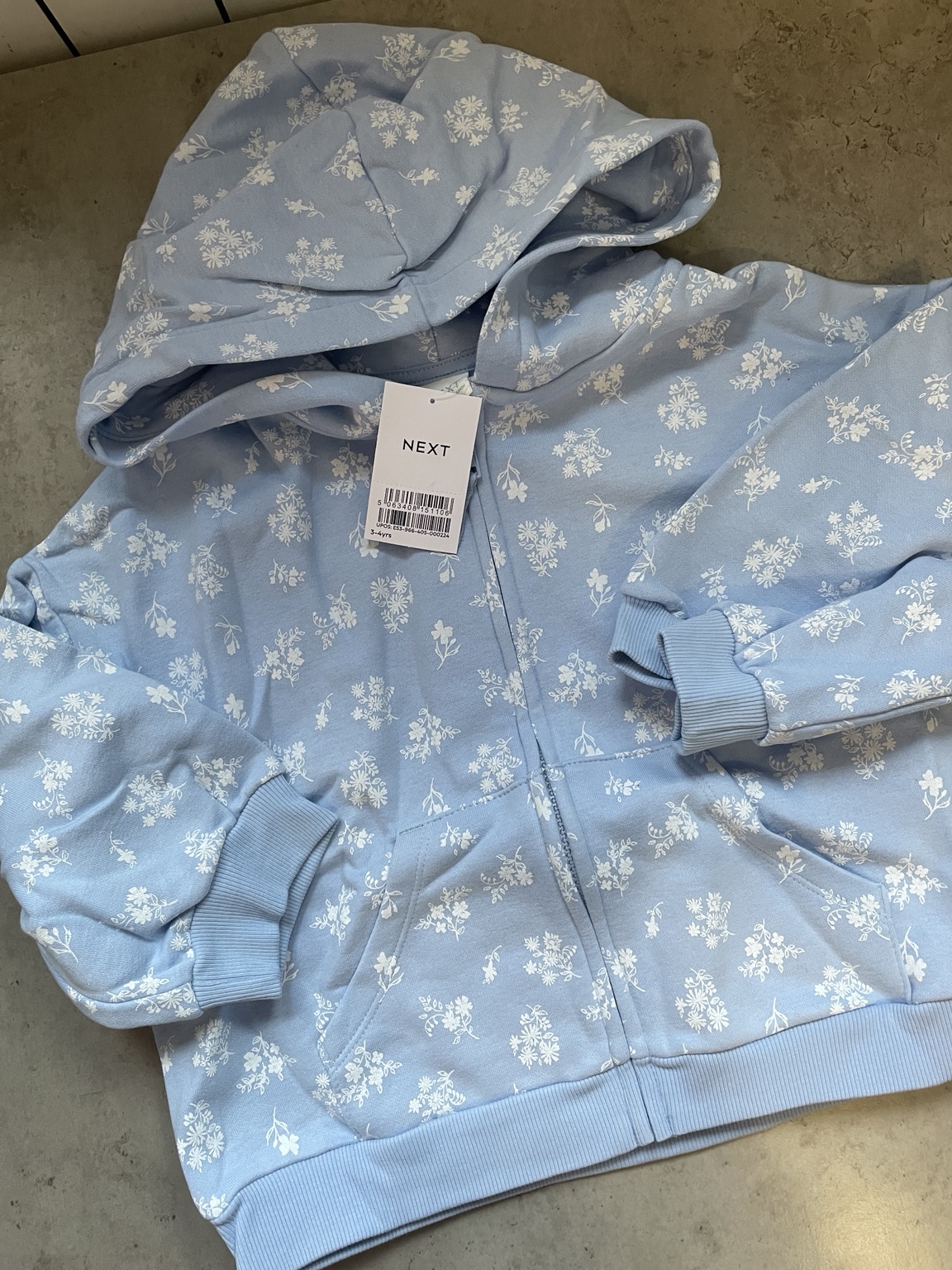 Niebieska bluza w kwiaty Next, rozmiar 3–4 lata